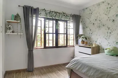a bedroom with a bed and a window at Panorama View Pool House Steiltes in Nelspruit