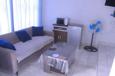a living room with a couch and a table at Exodus Guesthouse Mahlakwena Stee'lpoort in Steelpoort