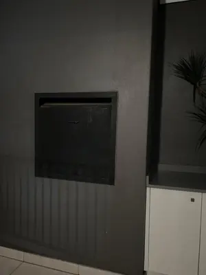 a flat screen tv on the wall of a room at 5 Bronco The Polofields in Midrand