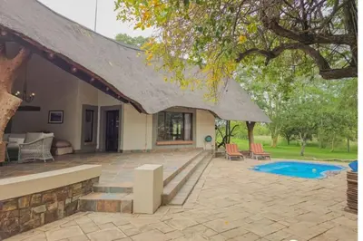 a house with a patio and a swimming pool at 76 Zebula- Premium Luxurious Villa in Bela-Bela! in Warmbaths
