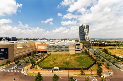 an aerial view of a city with a building at AlimamaSpaces Moskit's Newton Place in Midrand