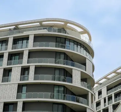 a tall apartment building with a round window at Serenity Getaway in Midrand