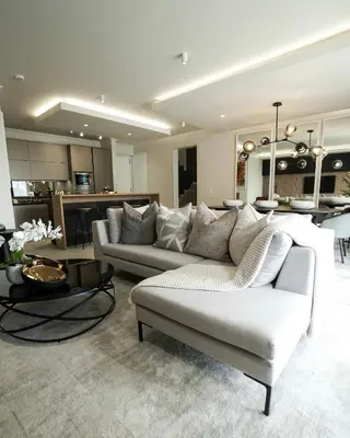 a living room with a couch and a table at Serenity Getaway in Midrand