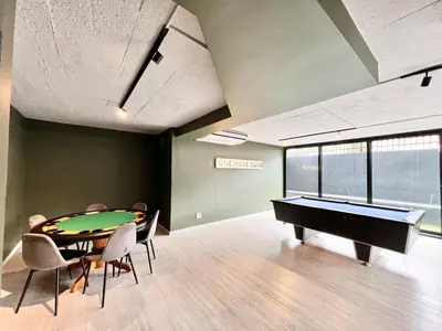 a room with a ping pong table and a pool table at Circa Urban Suite in Pretoria