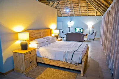 a bedroom with a large bed in a room at Collen Pillar Hotels, Windsor Royale