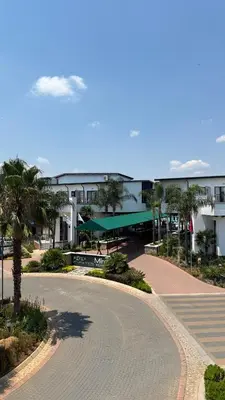 an empty street in front of a building at Lagoon Serenity Suite in Pretoria