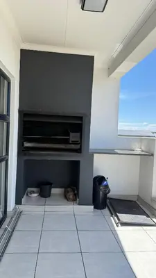 a room with a cat laying on the floor at Lagoon Serenity Suite in Pretoria