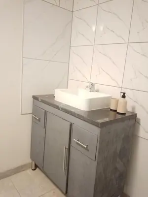 a bathroom with a sink and a mirror at Waterhole Lodge Unit 2 in Malelane
