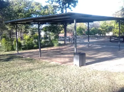 a pavilion in a park with a trash can at Munati B&B in Musina