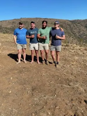 a group of men standing on top of a hill at Ithaba Falls Guest Farm Farm L59, Buffelsvley, Burgersfort, 1150 in Boerboomskraal