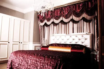 a bedroom with a bed with a baseball bat on it at Peermont Metcourt - Thaba Moshate in Burgersfort