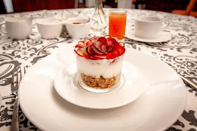 a dessert on a white plate on a table at Waters on Willows in Pretoria