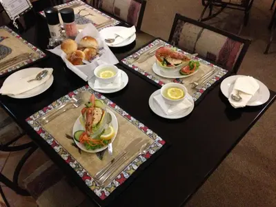 a table with three plates of food on it at Ipe Tombe Guest Lodge - Midrand in Midrand