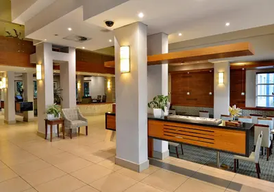 a lobby of a hospital with a reception counter at Town Lodge Waterfall, Midrand in Midrand