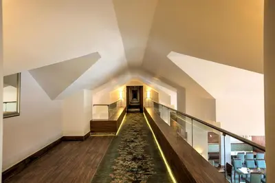 a hallway of a building with a large ceiling at Town Lodge Waterfall, Midrand in Midrand