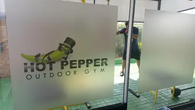 a sign for a hot pepper outdoor gym with a banana at Chill Pepper Boutique Hotel in Nelspruit