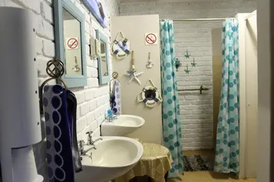 a bathroom with two sinks and a shower at Tarentilos in Tzaneen