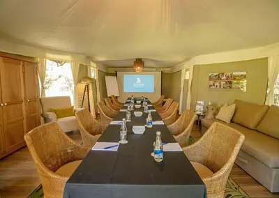 a conference room with a long table and chairs at Finfoot Lake Reserve by Dream Resorts in Vaalkop Dam