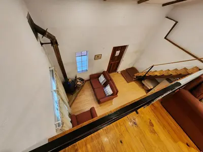 an overhead view of a living room with a couch at Softwaters Guesthouse Cottages in Louis Trichardt