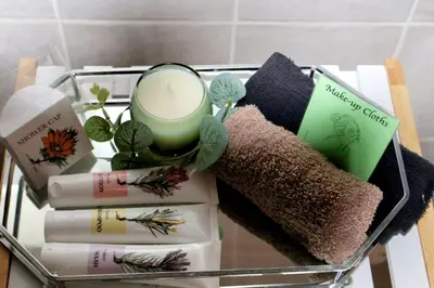 a tray with cosmetics and other items on a table at The Leopard Tree in Polokwane