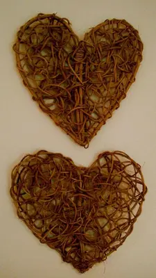 two heart shaped chocolate truffles sitting on a table at umSisi Cottage in White River