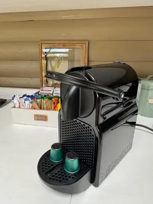 a coffee maker sitting on a counter in a room at Timmerstuga in Malelane