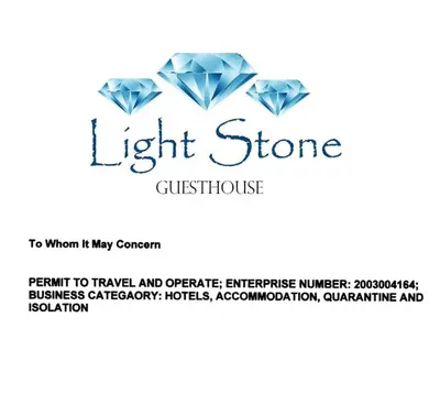 a light stone distributor sign with a blue diamond at LightStone Guesthouse in Centurion