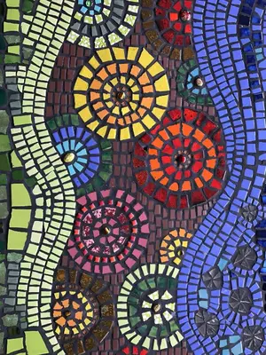 a mosaic of colorful umbrellas on a wall at Tinkers Lakeside Lodge - Kruger in White River