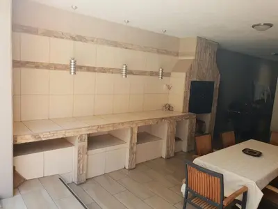 a room with a table and a table and a table and a table at Fa'Trez Guest House & Spa in Pretoria