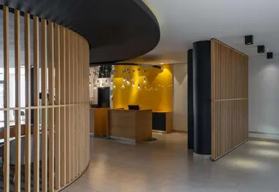 a lobby of a store with wooden dividers at Park Inn by Radisson Polokwane in Polokwane