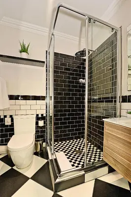 a bathroom with a toilet and a glass shower at Kgarebana Boutique Guesthouse in Tweefontein