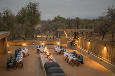 an outdoor dining area with tables and chairs at Karongwe - Becks Safari Lodge in Hoedspruit