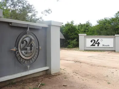 a sign that is on the side of a building at 24 Degrees South Country Estate in Hoedspruit