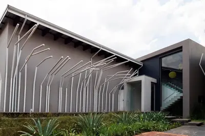 a modern house with a metal facade at Alpine Attitude Boutique Hotel & Conference Venue in Pretoria