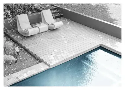 two lounge chairs and a pool of water at Alpine Attitude Boutique Hotel & Conference Venue in Pretoria