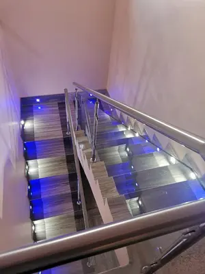 an escalator with blue lights on top of it at Zurich garden lodge benoni in Benoni