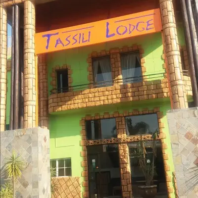 a teshil lodge building with a sign on it at Tassili Lodge in Kempton Park