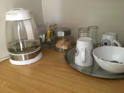 a counter top with a food processor and a bowl at Birrea Guest house in Polokwane