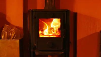 a brick oven with a fire in it at Verlorenkloof in Dullstroom