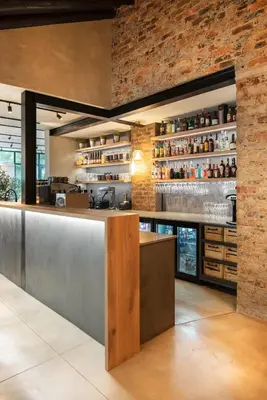 a bar in a restaurant with a brick wall at Opikopi Guest House in Pretoria