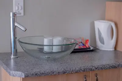 a glass bowl sitting on top of a counter at 314 on Clark Guest House in Pretoria