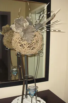 a basket on top of a table with a mirror at Porcupine Ridge Guest House in Sabie