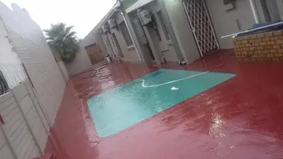 a pool with a golf ball in the middle of a house at Sir Pinto Guesthouse in Witbank