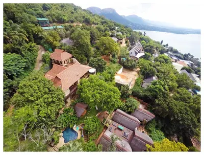 an aerial view of a house on a hill at Bali at Scenic Haven Lodge in Hartbeespoort in Hartbeespoort