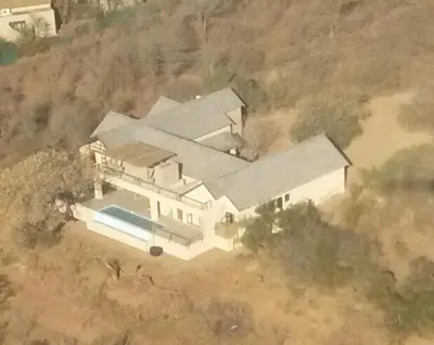 an aerial view of a house with a swimming pool at MANZINI RIVER HOUSE - Mjejane Private Game Reserve, Greater Kruger National Park in Hectorspruit