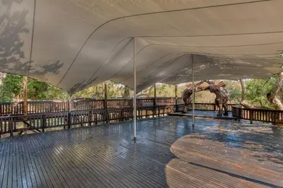 a large tent on a deck at a zoo at Protea Hotel by Marriott Polokwane Ranch Resort in Polokwane