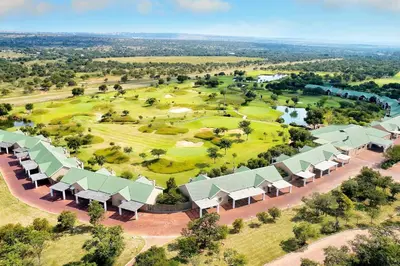 an aerial view of a resort with a golf course at Protea Hotel by Marriott Polokwane Ranch Resort in Polokwane