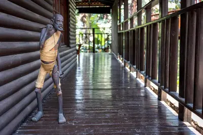 a statue of a man standing on a walkway at Beetleloop Guest House in Nelspruit