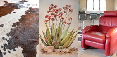 a red chair and a cactus in a room at Route 40 in Hoedspruit