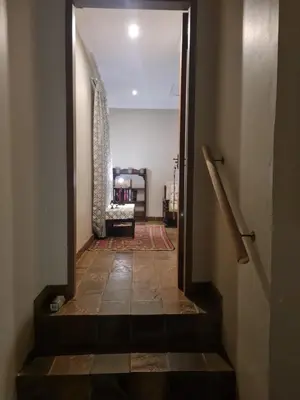 a hallway with a stairway leading to a room at 282 Guesthouse/Self-Catering in Centurion